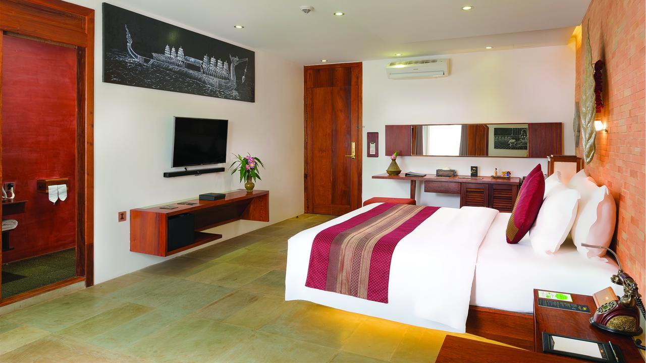 Golden Temple Residence Siem Reap Exteriér fotografie A bedroom at the hotel